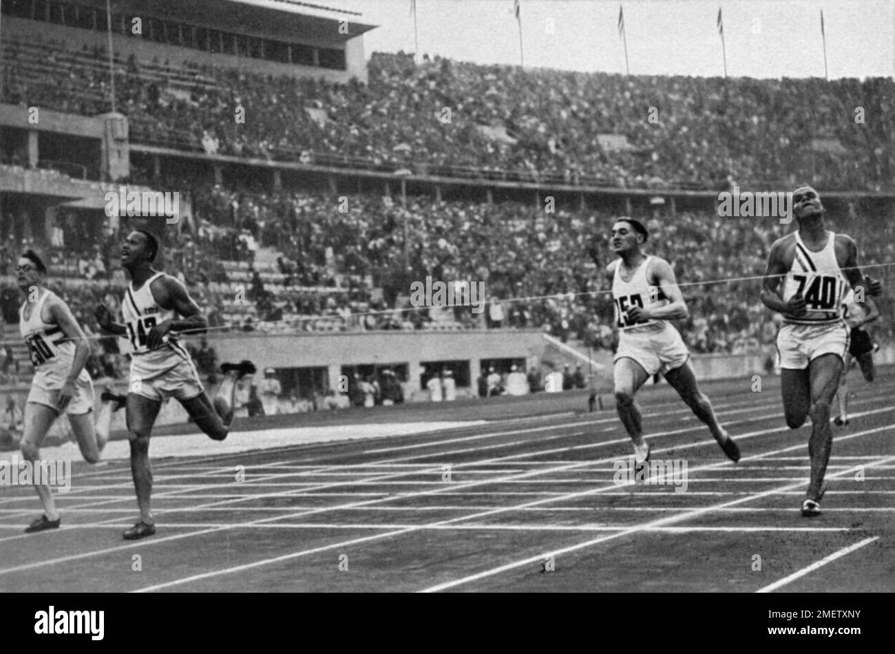 At the finish of the 400 m run, Archie Williams, USA (2nd from left) wins ahead of Brown, Great Britain and Lu Valle, USA Stock Photo
