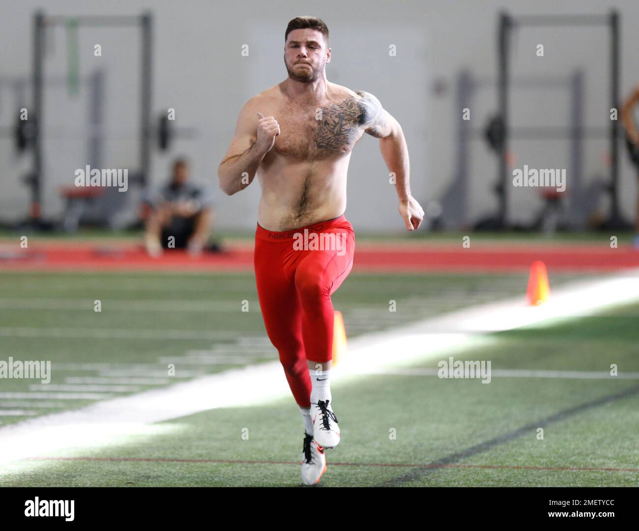 Ohio State tight end Luke Farrell runs the 40 yard dash during an NFL