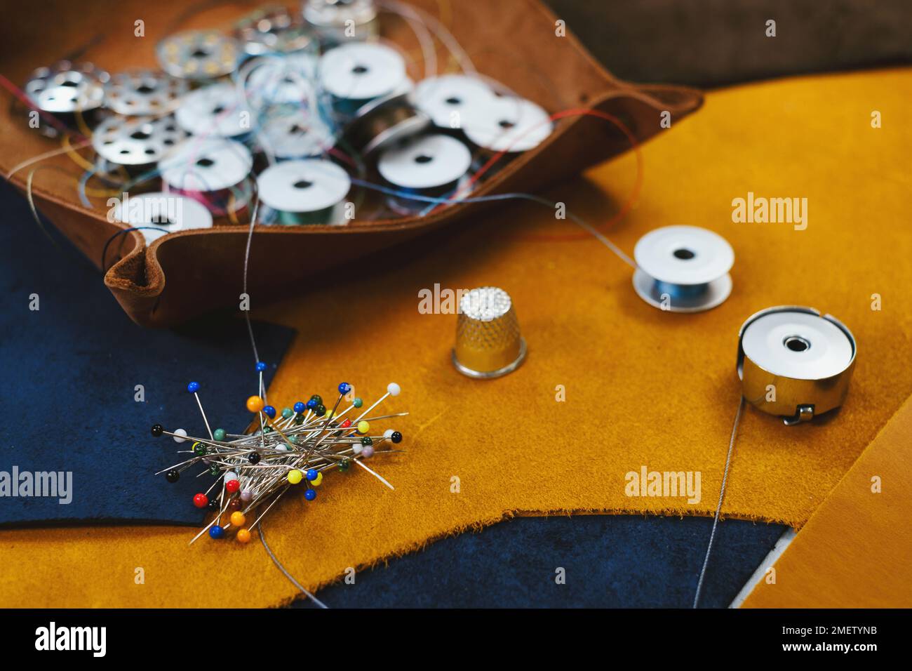 Tailor workplace accessories. Close up view of the eco leather and
