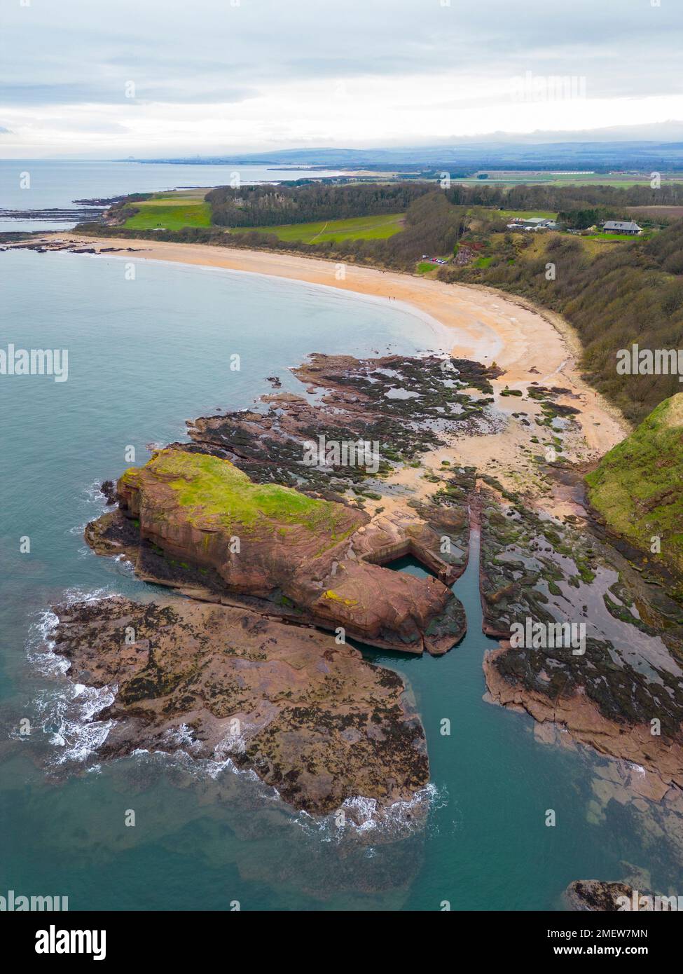 Aerial view looking down on Seacliff harbour and beach near North Berwick in East Lothian