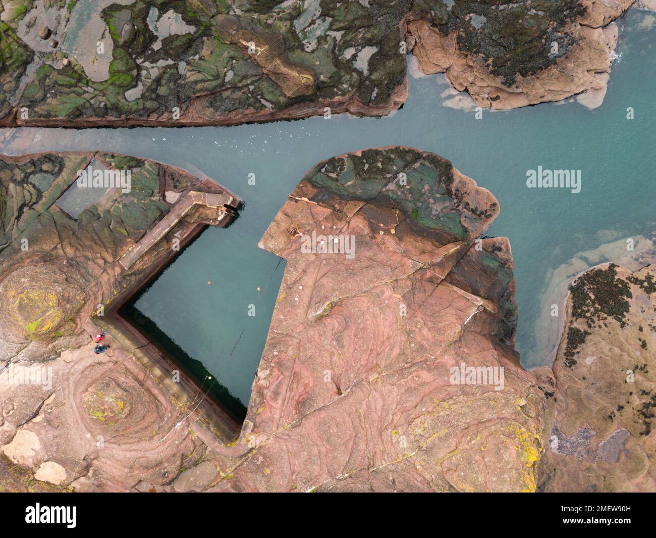 Aerial view looking down on Seacliff harbour carved out of rock near North Berwick  in East Lothian, Scotland UK Stock Photo