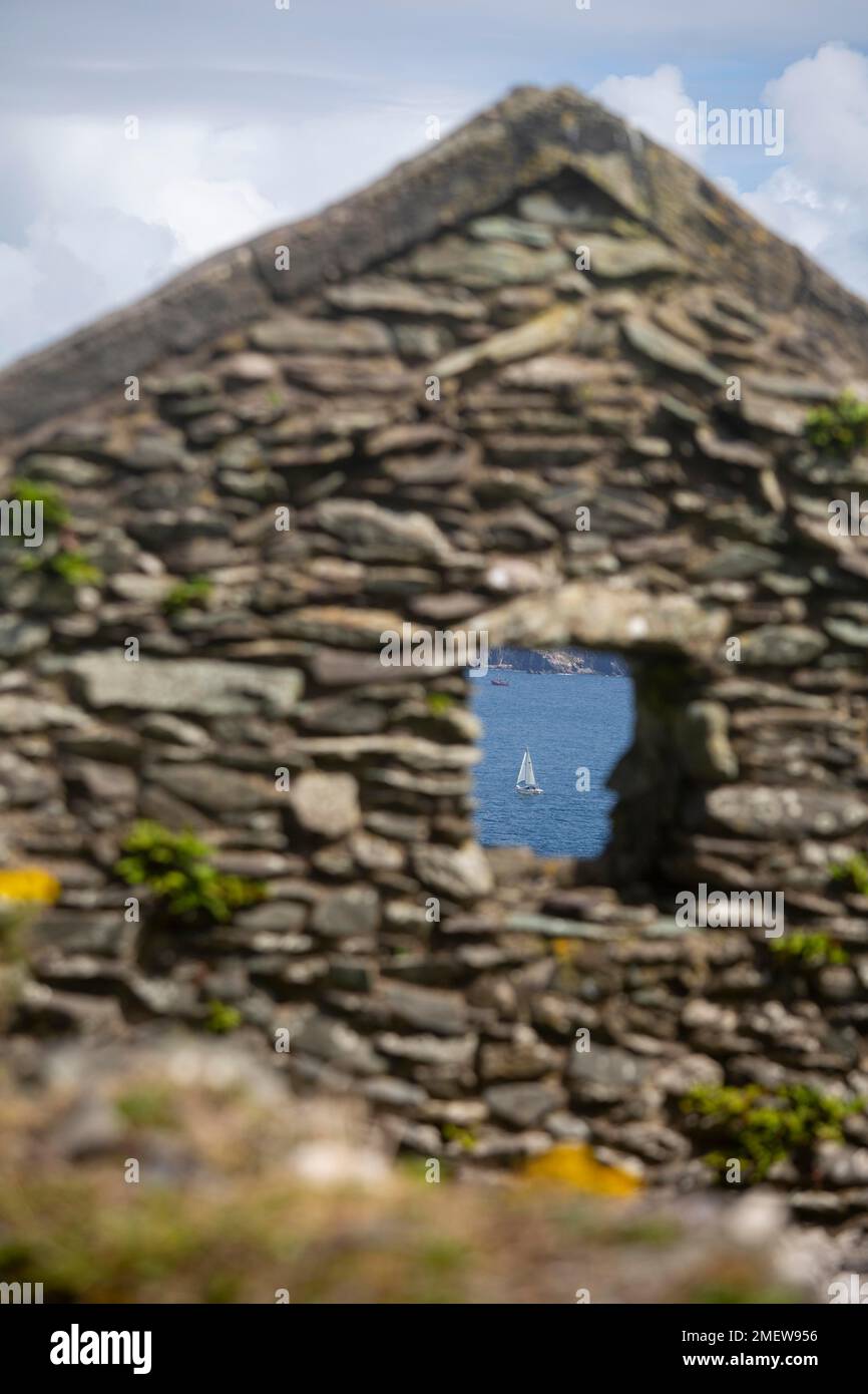 Decaying gable end and window of former village house on Great Blasket