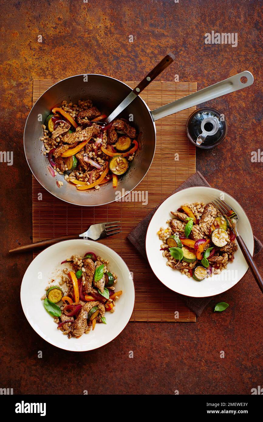 Turkey and Balsamic Vinegar Stir Fry with Farro Stock Photo