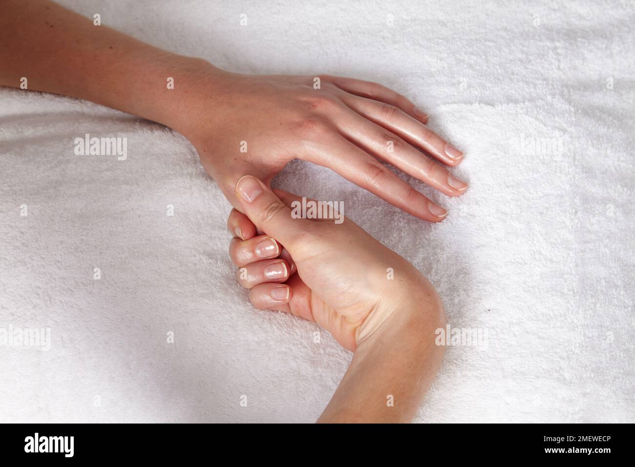 Hand massage gripping finger 2 Stock Photo Alamy