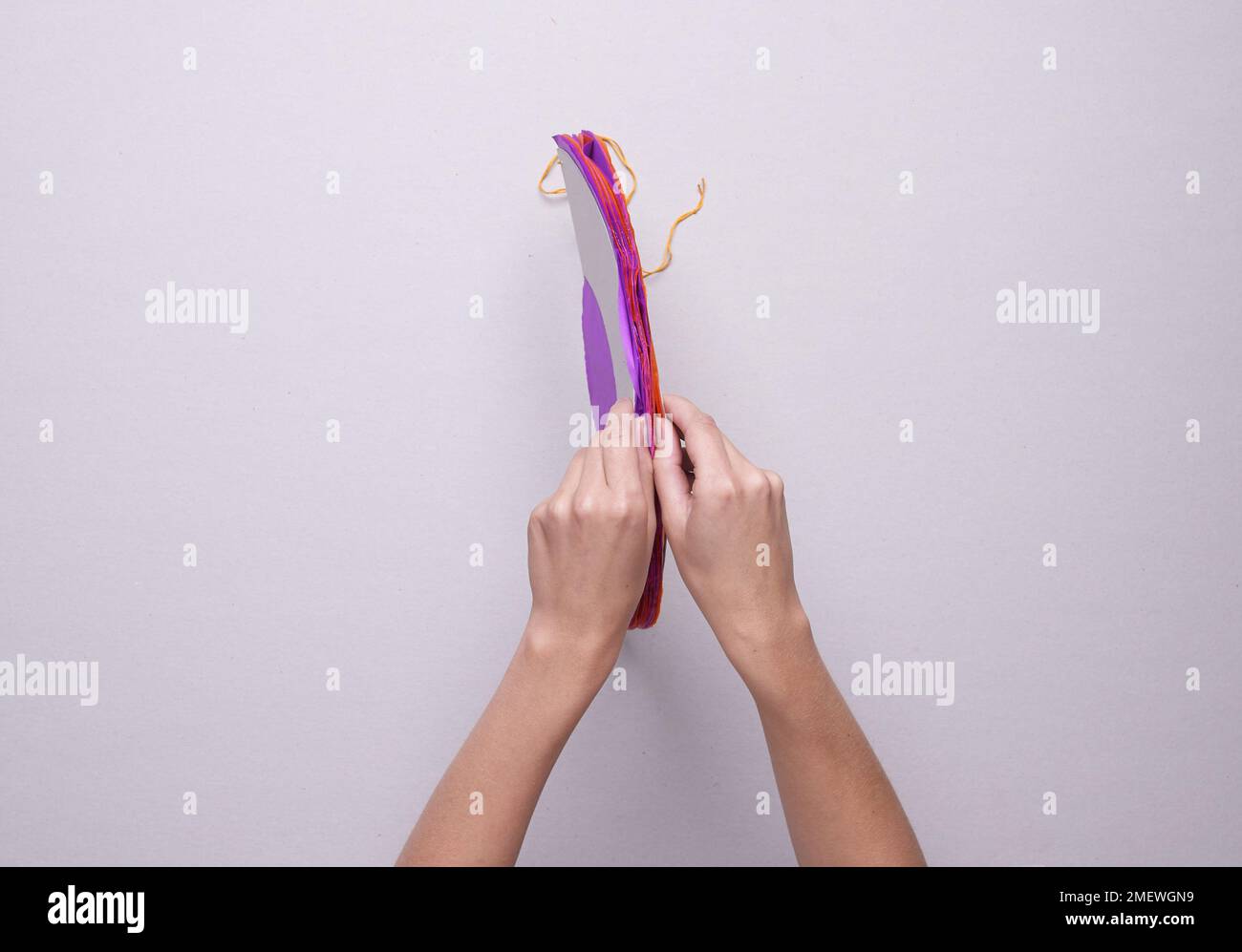 Steps and materials used to make a papercraft pompom Stock Photo Alamy