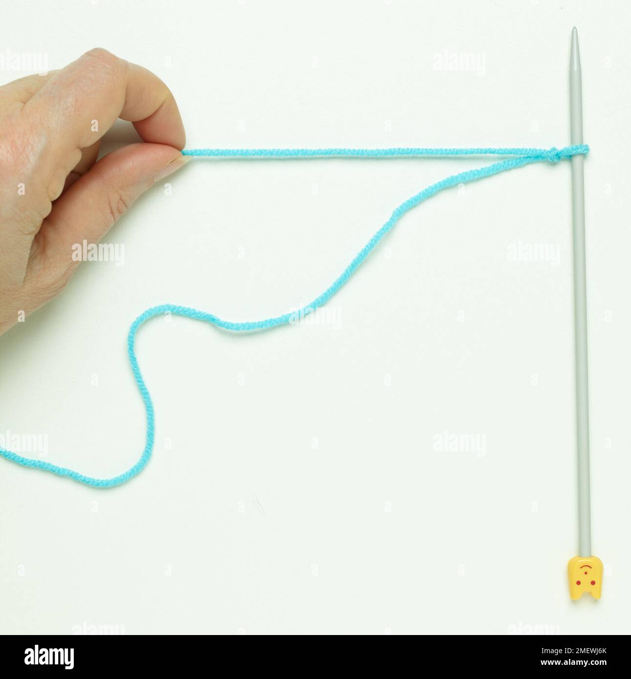 Slip knot before casting on knitting Stock Photo