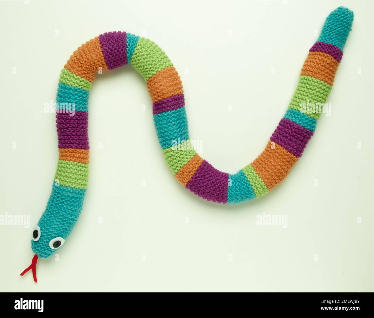 Knitted toy snakes Stock Photo