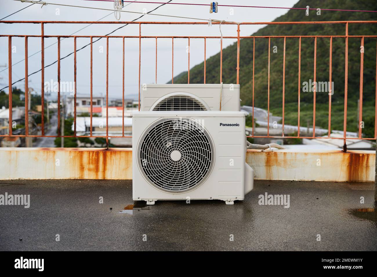 Panasonic air conditioning unit on rooftop; Okinawa, Japan Stock Photo