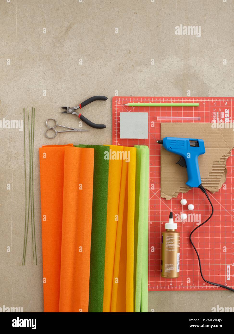 Papercraft. DIY Paper Ranunculus you will need equipment Stock Photo Alamy