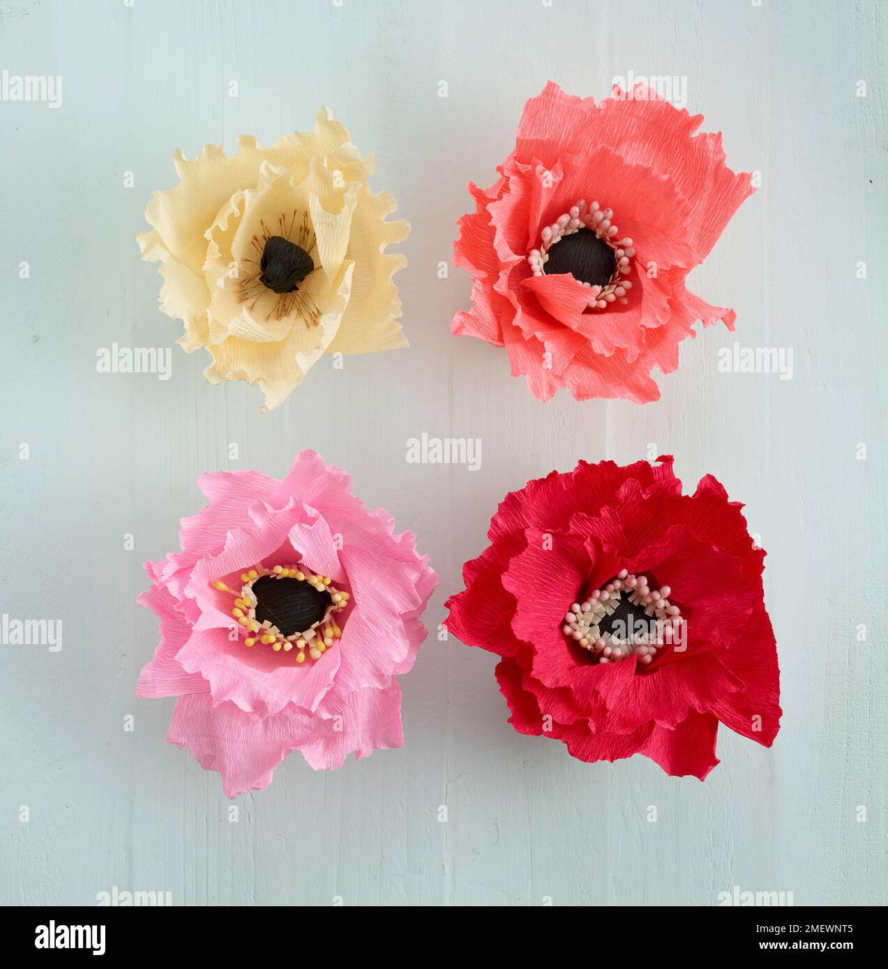 Papercraft bright coloured paper poppy Stock Photo
