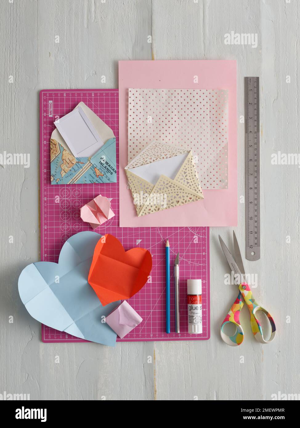 Papercraft. DIY origami envelopes equipment shot Stock Photo Alamy