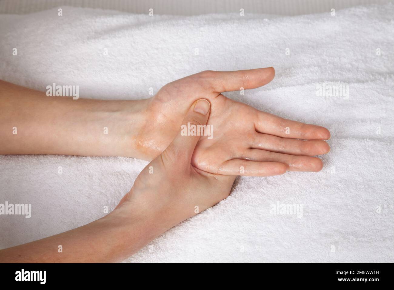 Hand massage massaging palm 4 Stock Photo Alamy