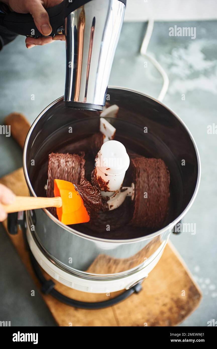 Grinding and conching chocolate Stock Photo Alamy