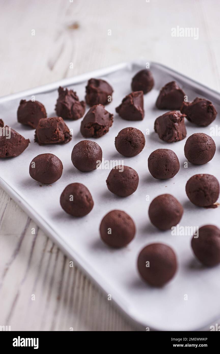 Rolling and dipping truffles Stock Photo