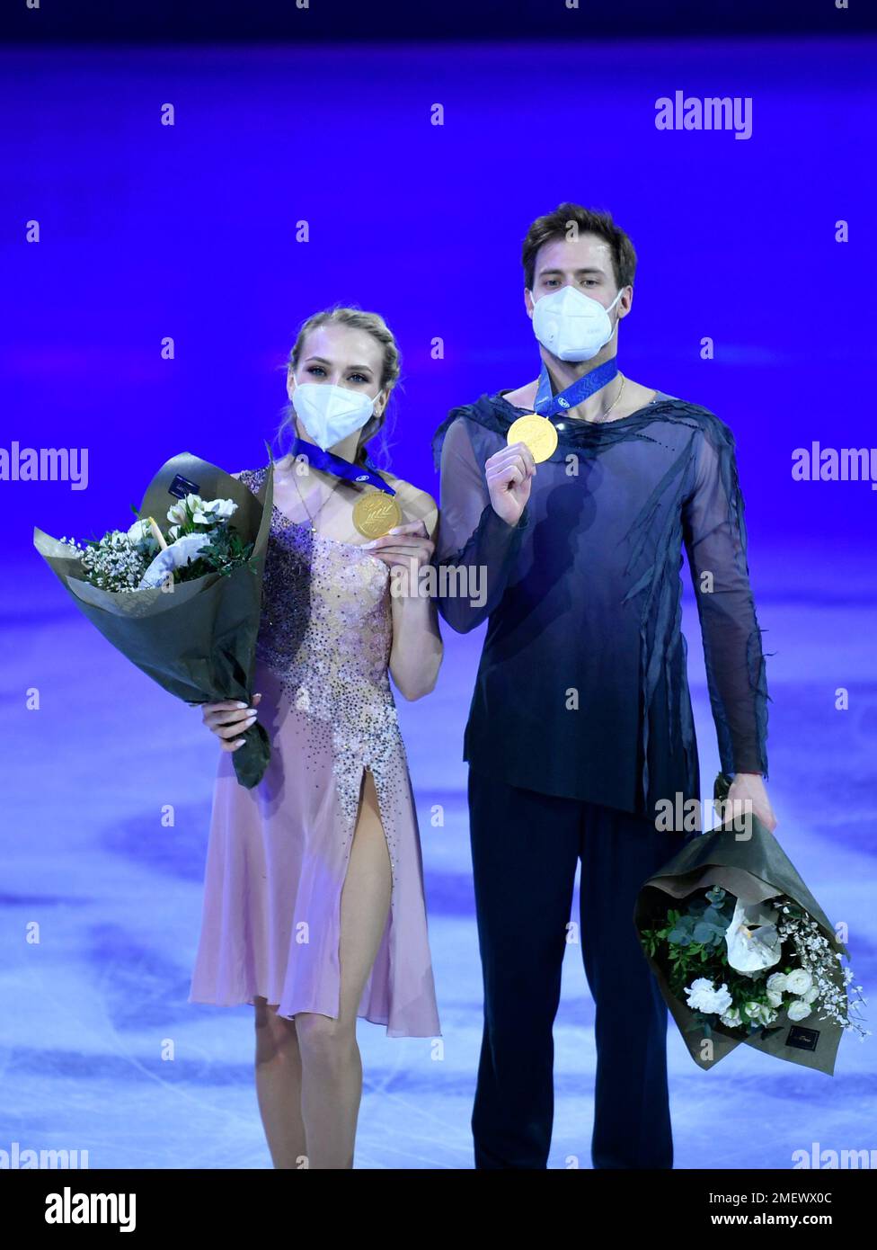 Russian ice dancers Victoria Sinitsina and Nikita Katsalapov stand on