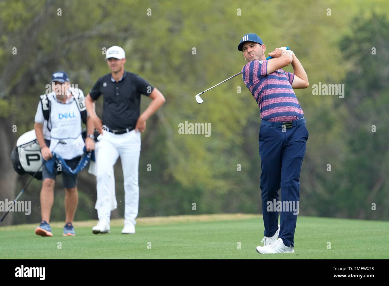 Sergio Garcia, of Spain, hits his second shot out of bounds on the No