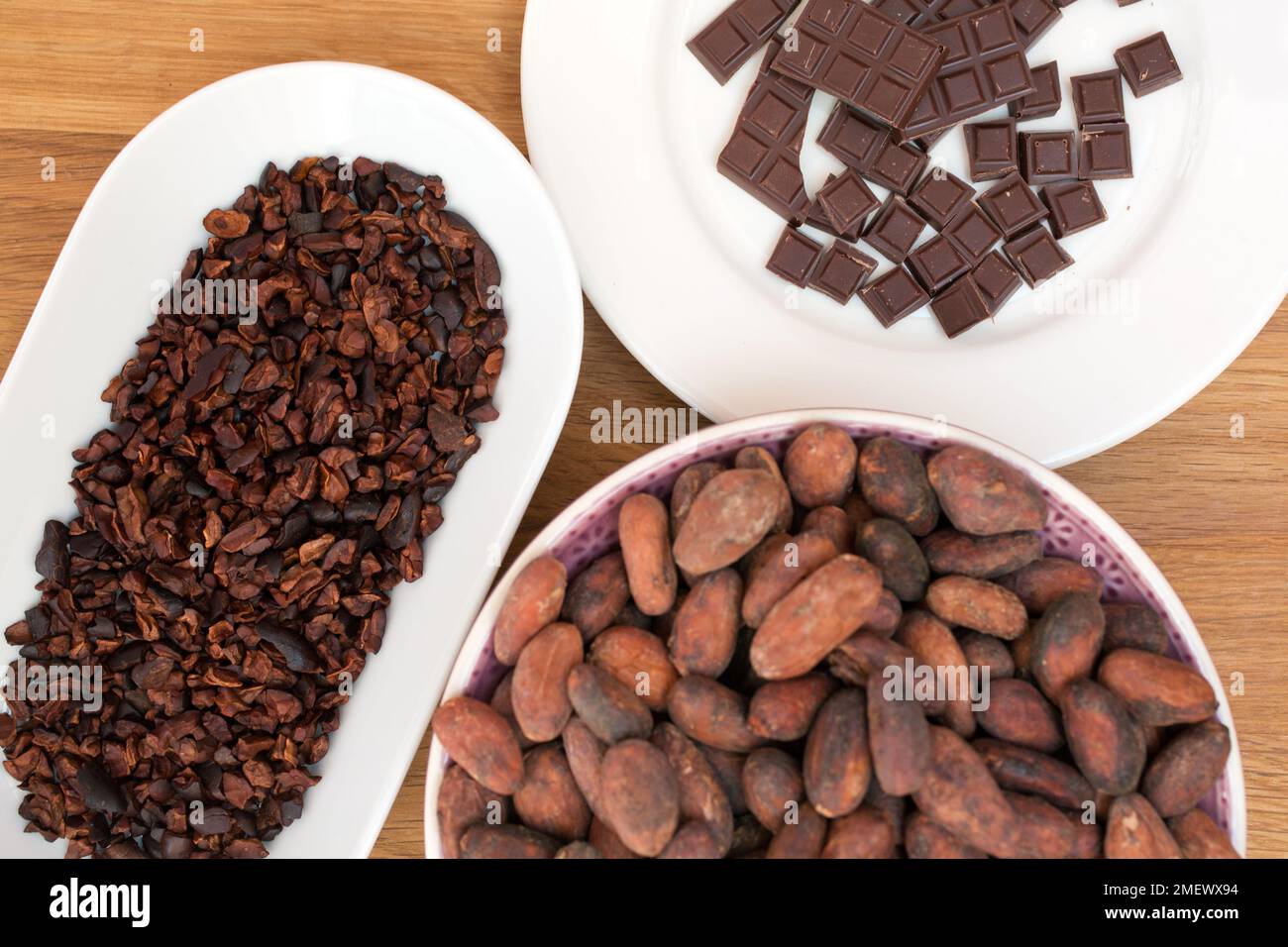 Chocolate, cocoa beans, and cocoa nibs Stock Photo Alamy