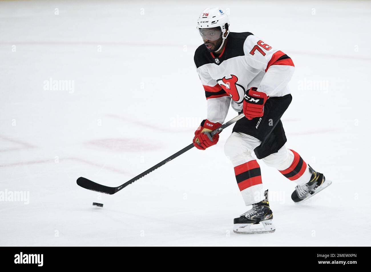 New Jersey Devils defenseman P.K. Subban (76) stretches before an NHL hockey  game against the Vancouver Canucks Monday, Feb. 28, 2022, in Newark, N.J.  The Devils wore warmup jerseys designed by Subban