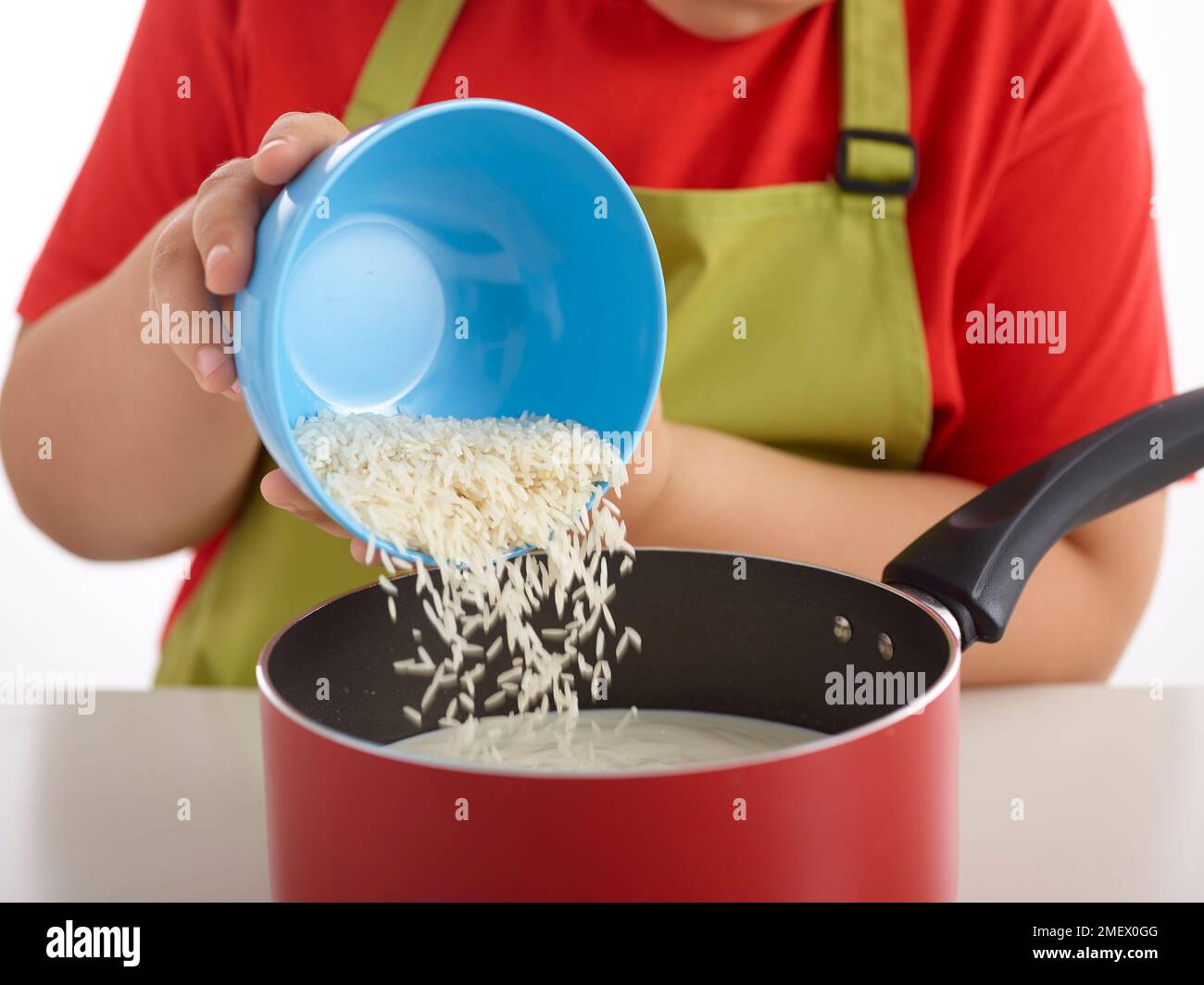 steps for indian rice pudding, step 1 Stock Photo Alamy