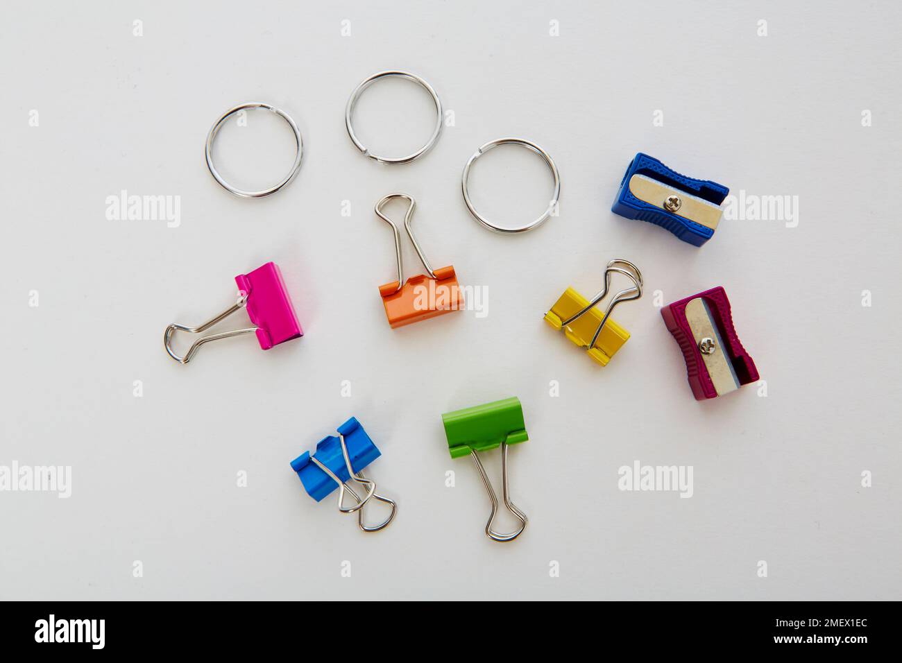 Clips, pencil sharpeners and metal rings Stock Photo