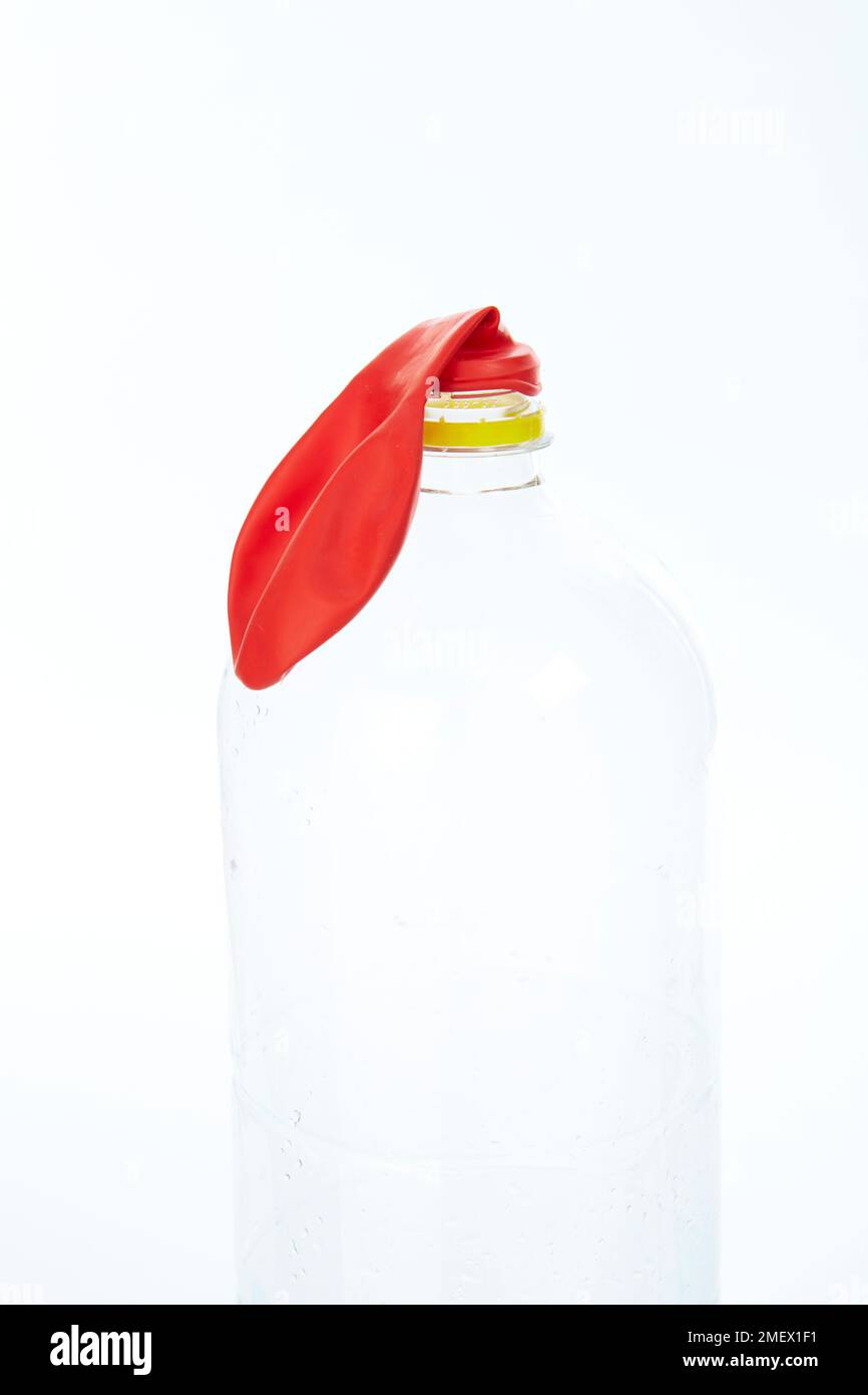 Plastic bottle with red balloon Stock Photo Alamy
