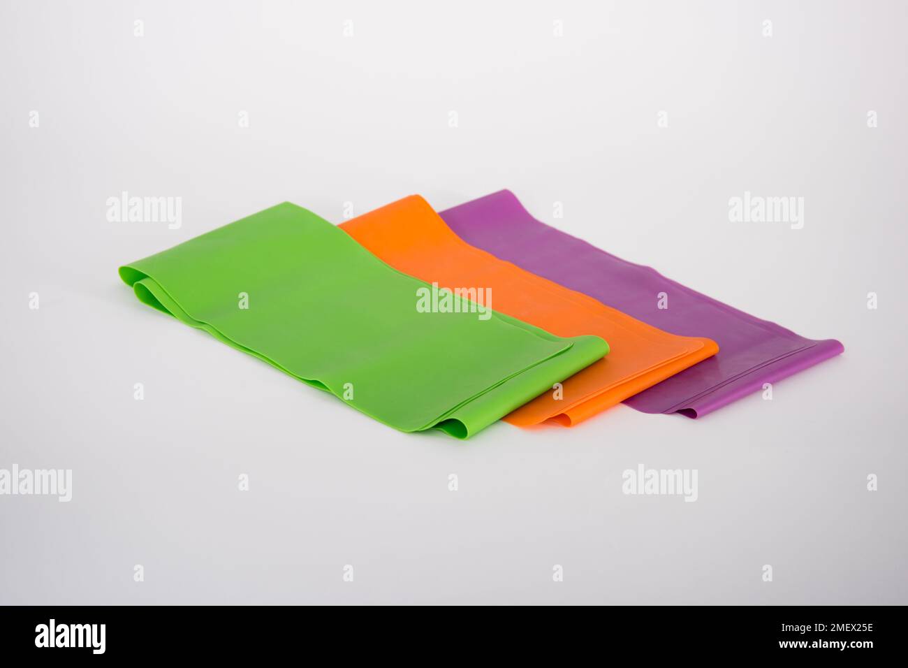 Resistence Band Background White background, equipment, resistance bands Stock Photo - Alamy
