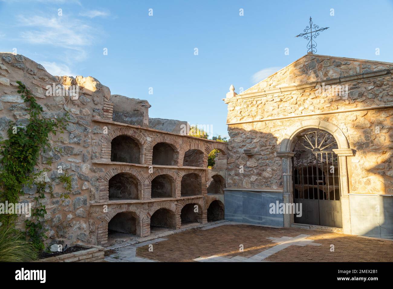 Burial crypts in the restored cemetery in the grounds of Polop Castle