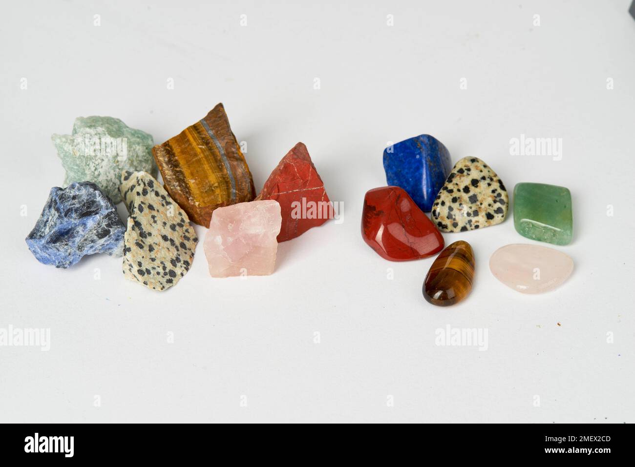 Raw and tumbled stones Stock Photo - Alamy
