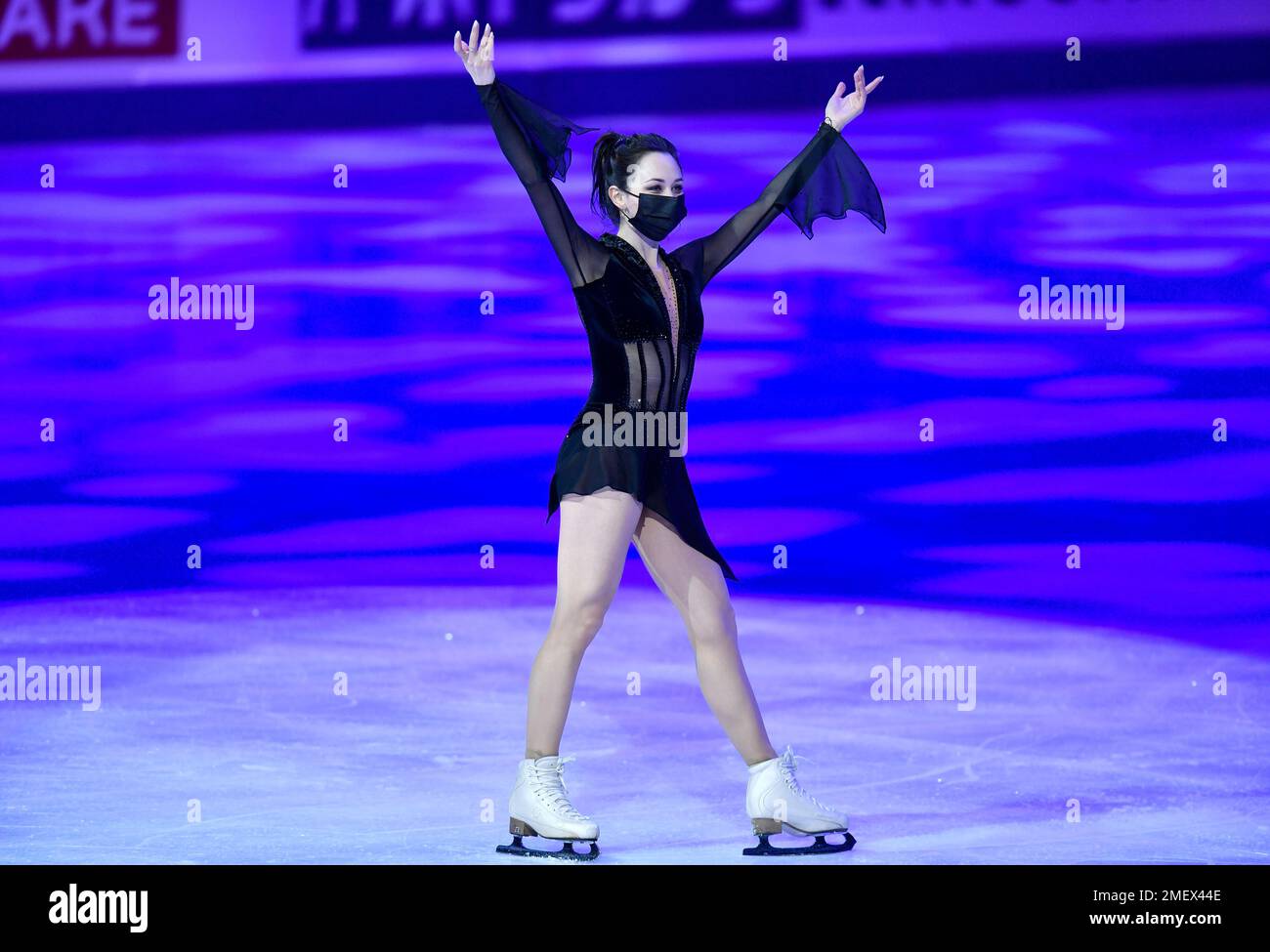 Russian skater Elizaveta Tuktamysheva celebrates on the ice after