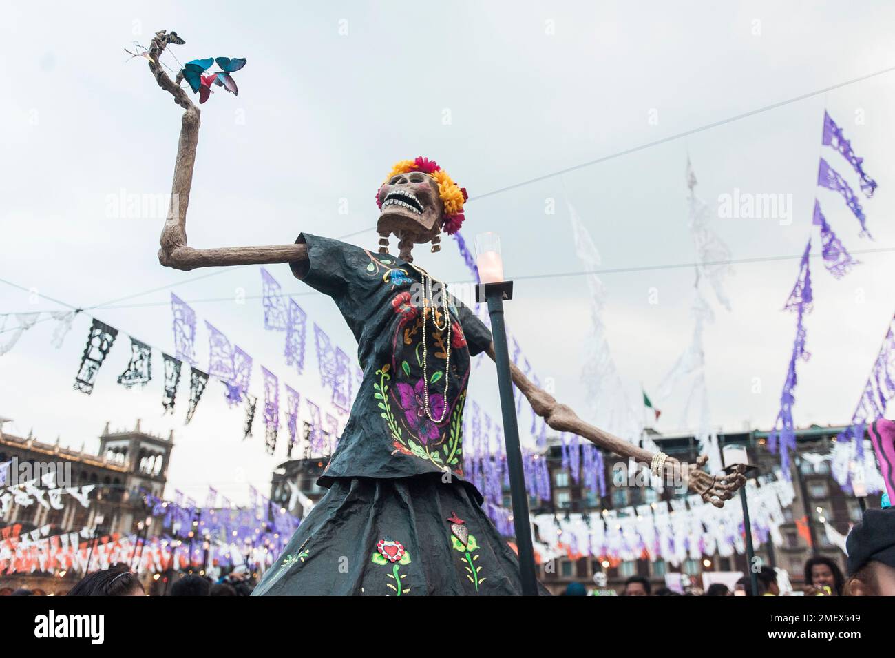 A skeleton sugar skull parade float at the Day of the Dead festival in