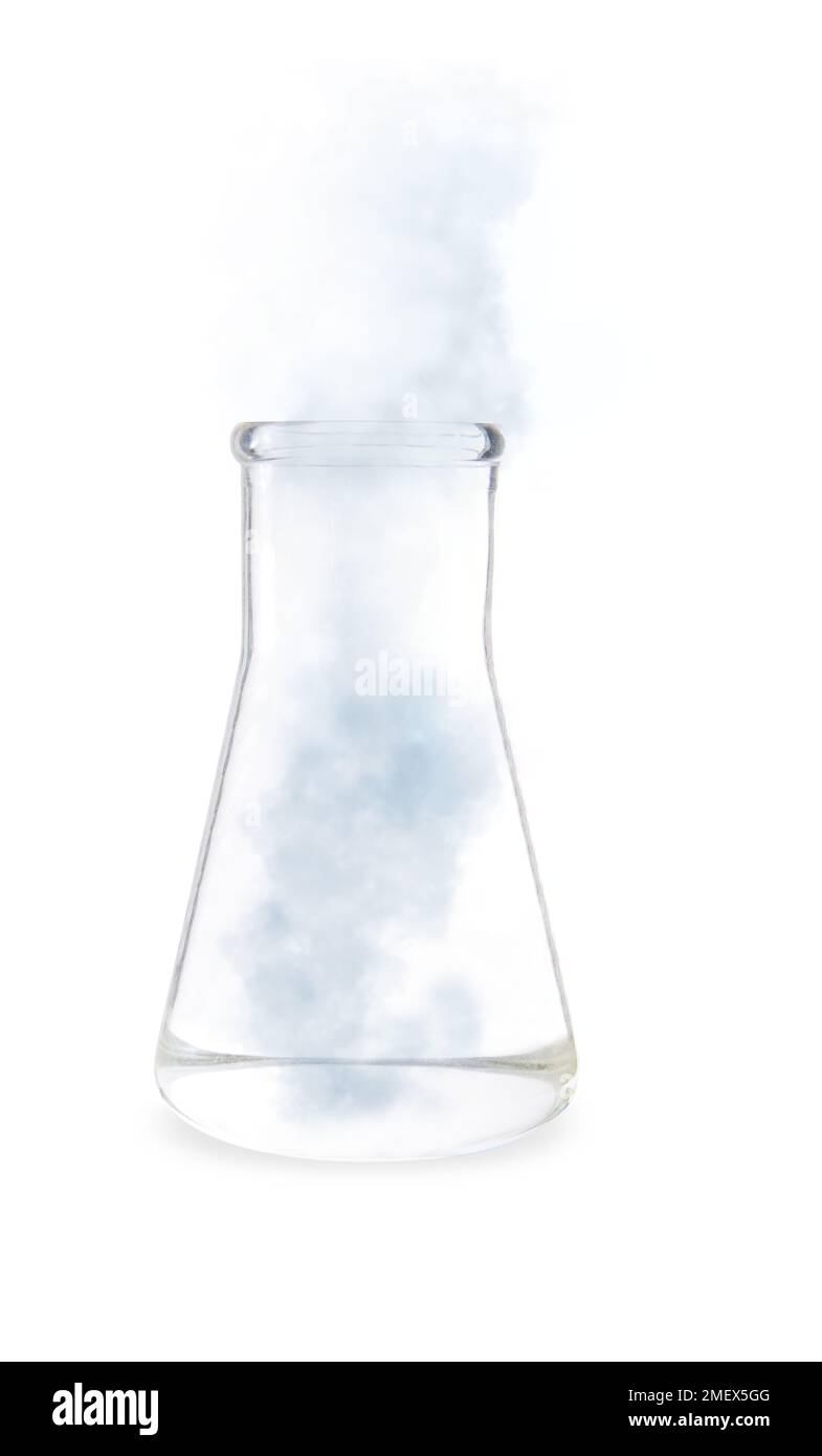 Glass conical flask containing water being heated Stock Photo