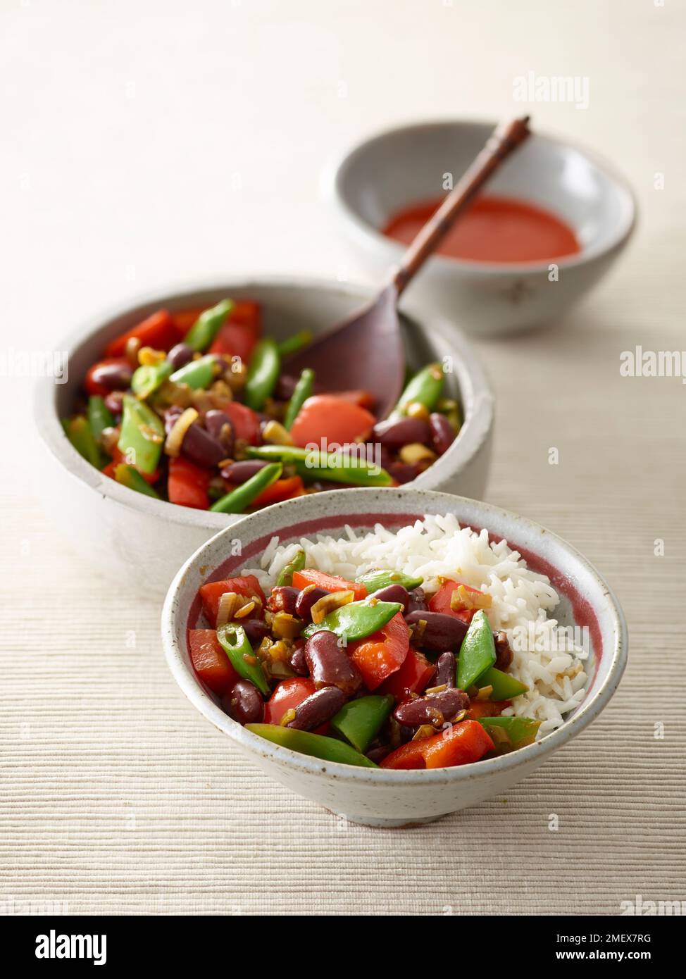 Coconut rice with spicy kidney beans Stock Photo