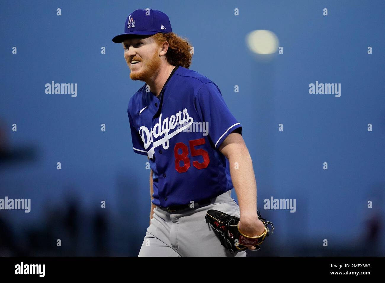 Los Angeles Dodgers starting pitcher Dustin May (85) smiles after