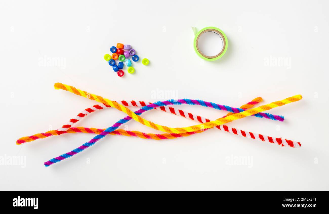 Pipe cleaners, peads, green tape Stock Photo Alamy