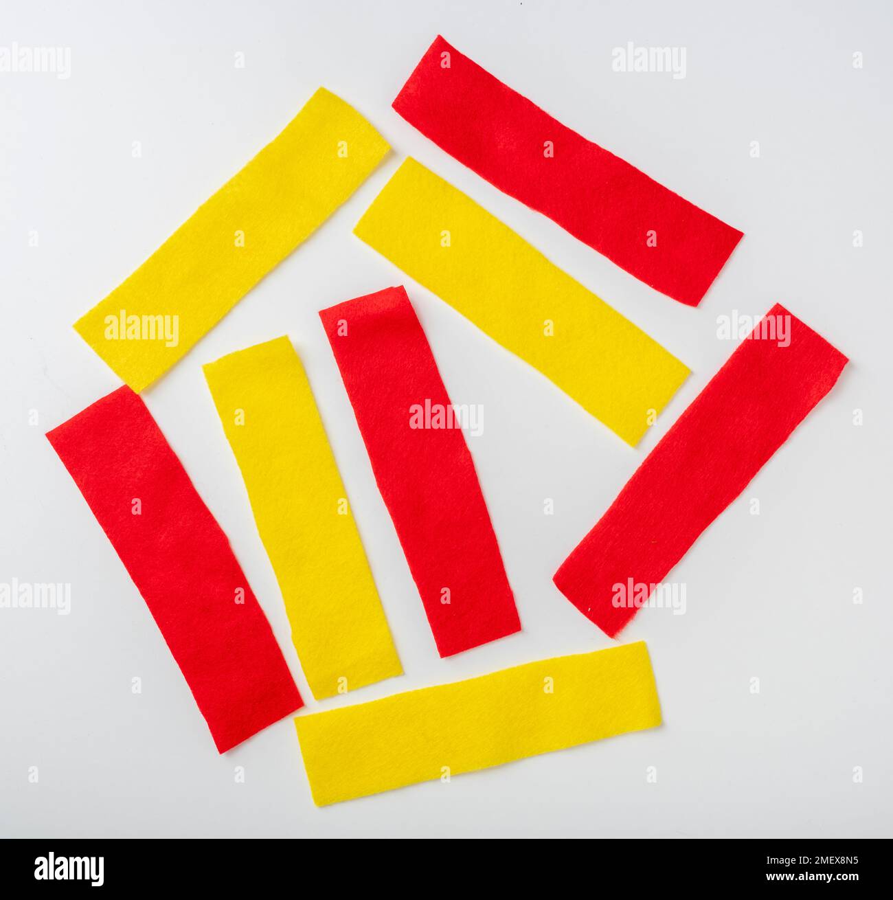 Strips of red and yellow felt Stock Photo