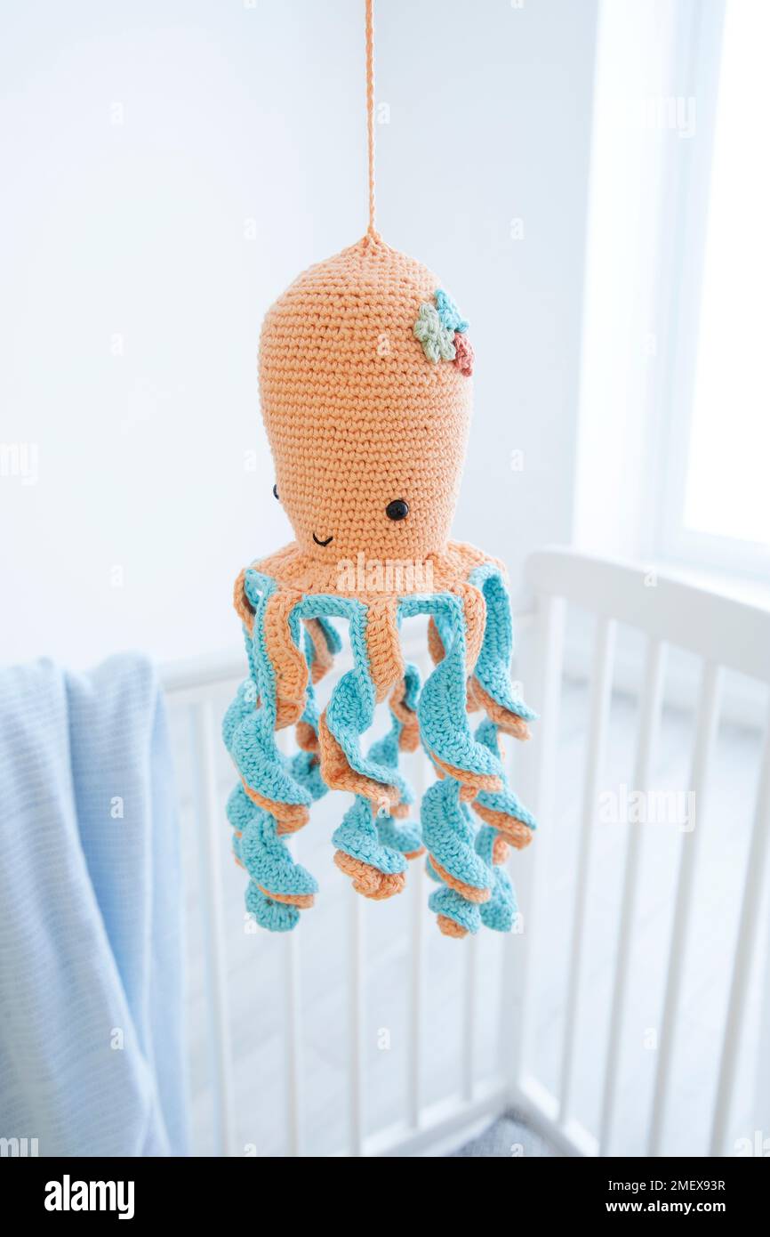 Crochet project-Hanging octopus toy Stock Photo