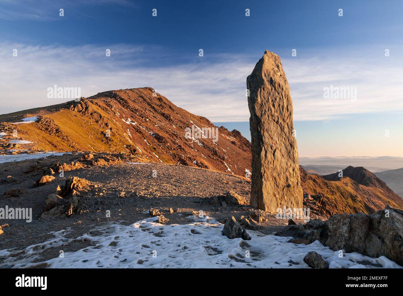 Marker stone on the Miners Path, Snowdon, Wales Stock Photo