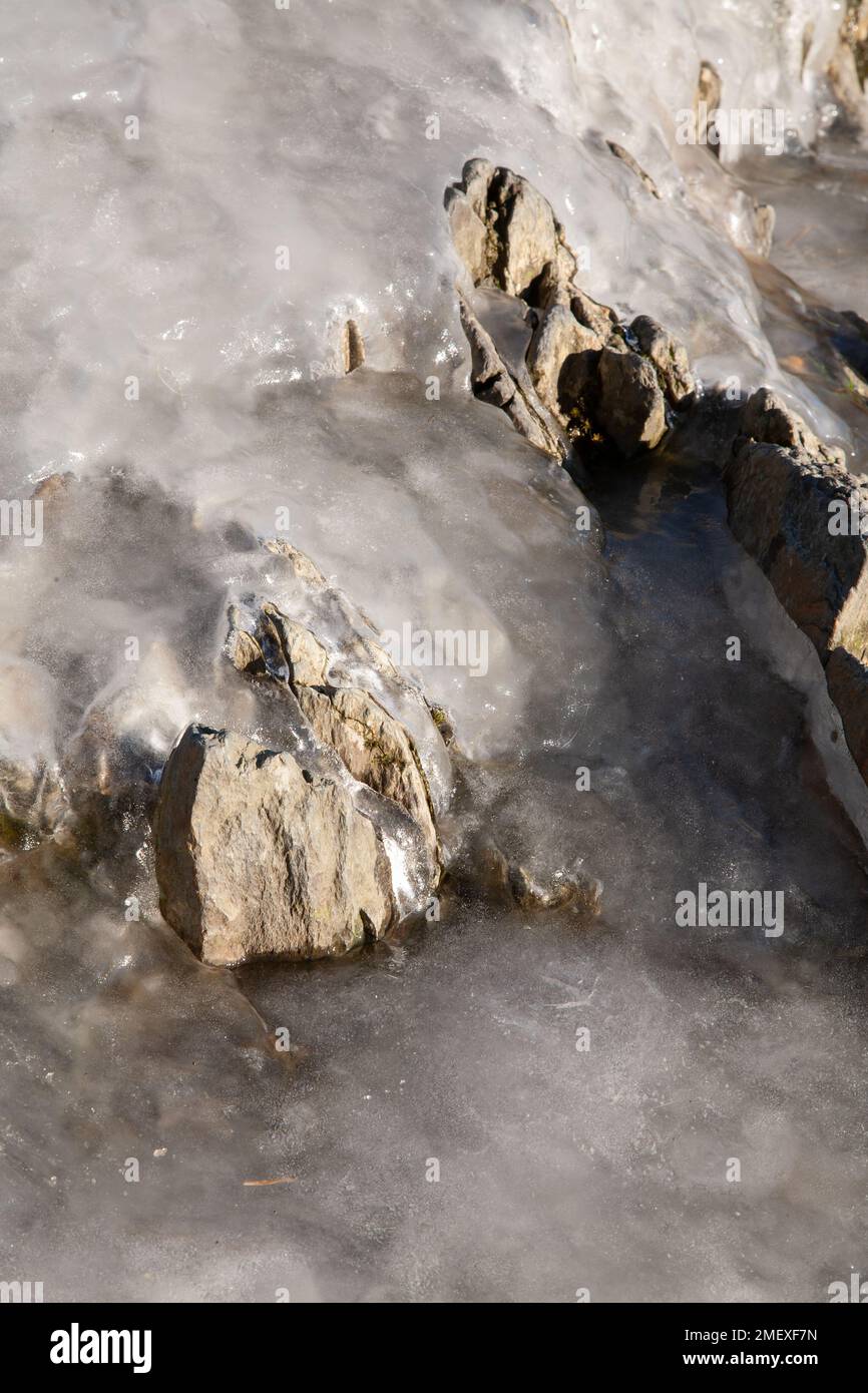 Ice covered rocks in winter Stock Photo