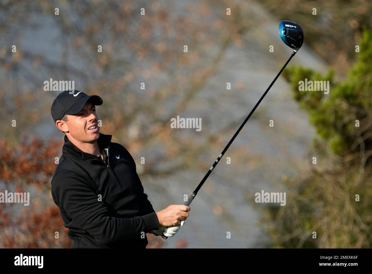 Rory McIlroy, of Northern Ireland, hits a provisional ball off the