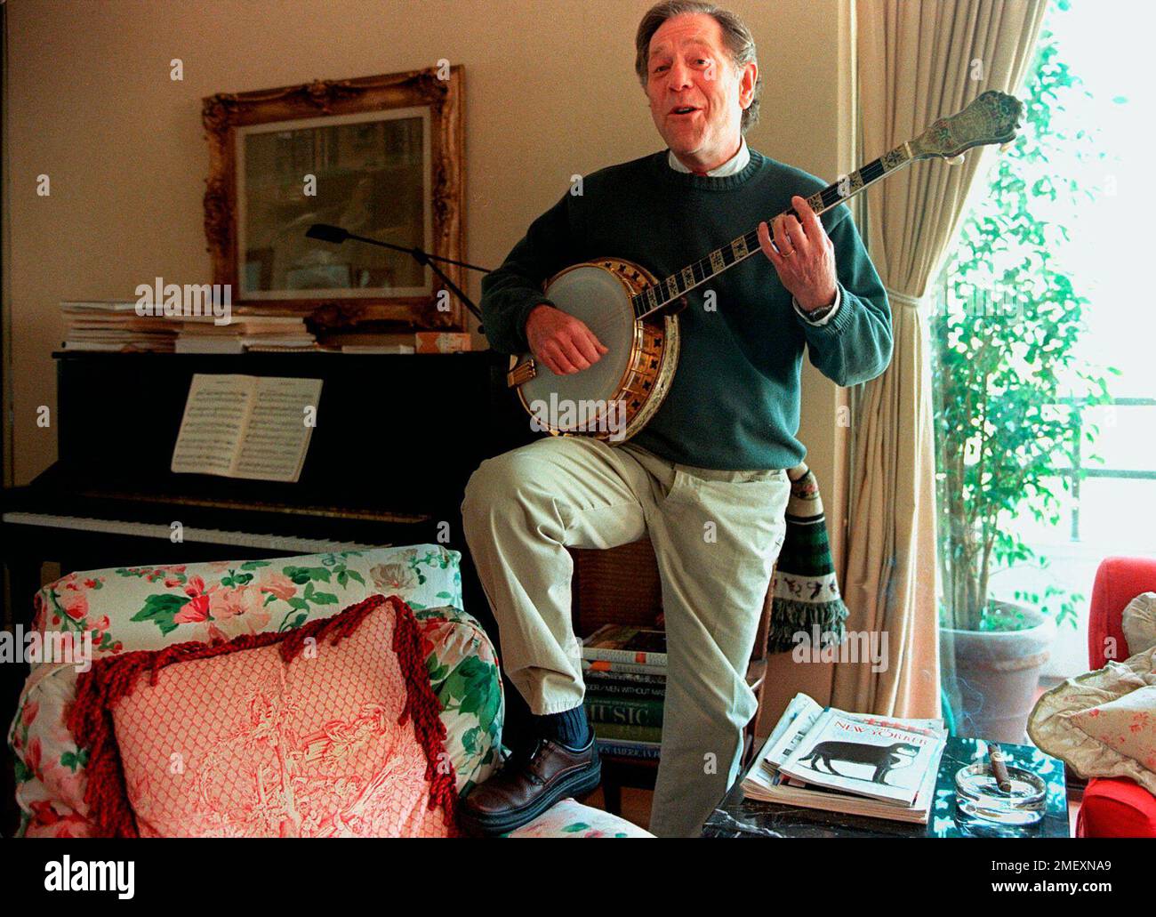 FILE - Actor George Segal plays the banjo at his home in Los Angeles on ...