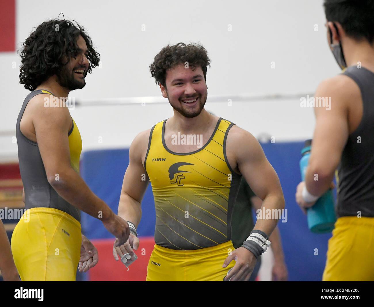 SC United's Dimitri Gordillo is congratulated on his rings performance ...
