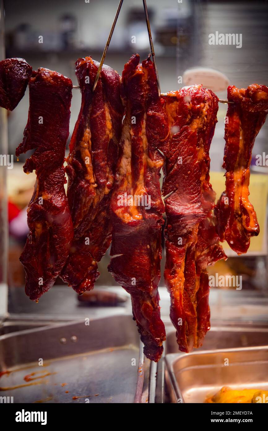 BBQ Pork hanging in a chinese restaurant Stock Photo