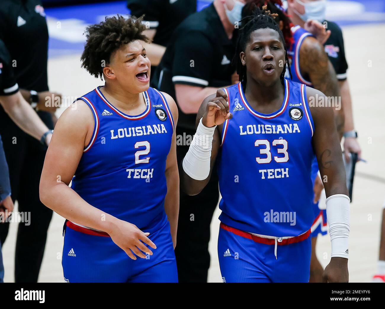 Louisiana Tech forwards Kenneth Lofton, Jr. (2) and Andrew Gordon (33)  celebrate a win over Mississippi after an NCAA college basketball game in  the NIT, Friday, March 19, 2021, in Frisco, Texas. (
