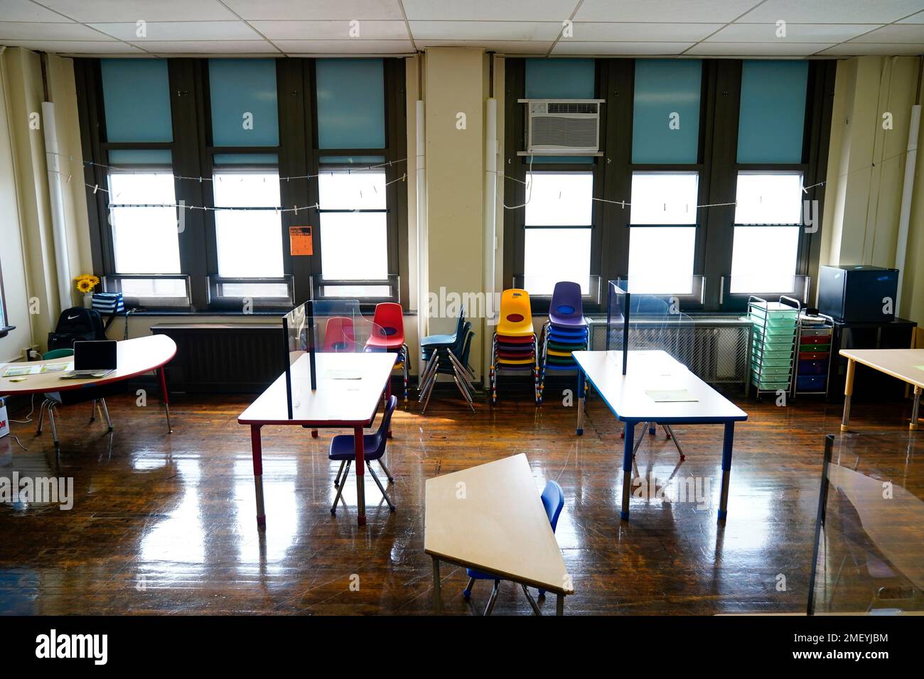 Desks are spaced apart ahead of planned inperson learning at Nebinger
