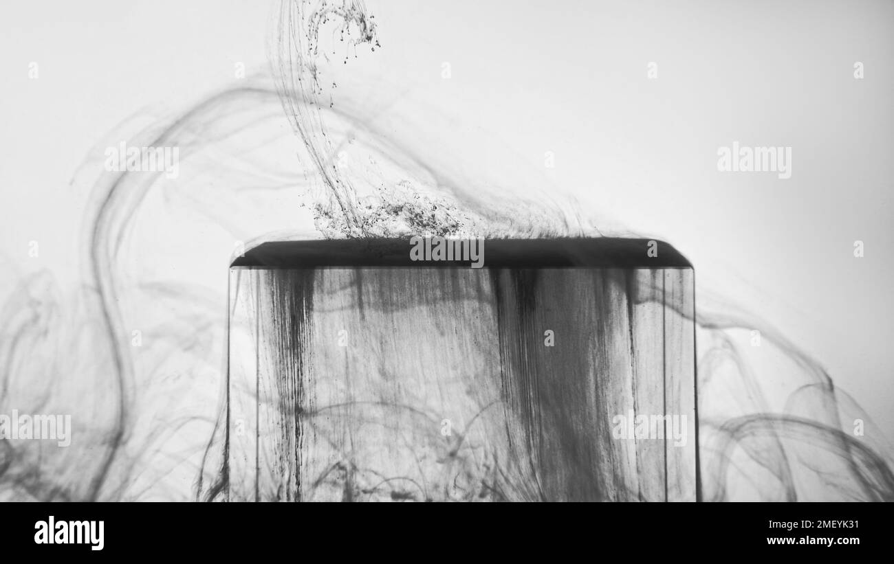 Black fume glass cube ink water smoke on white Stock Photo Alamy