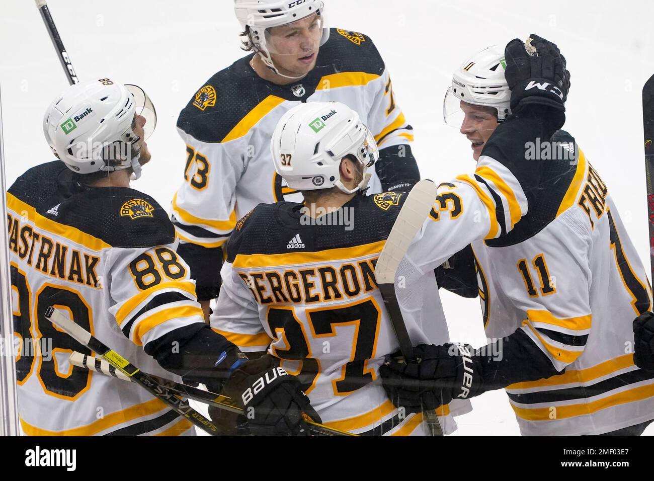 Trent Frederic of the Boston Bruins celebrates after scoring