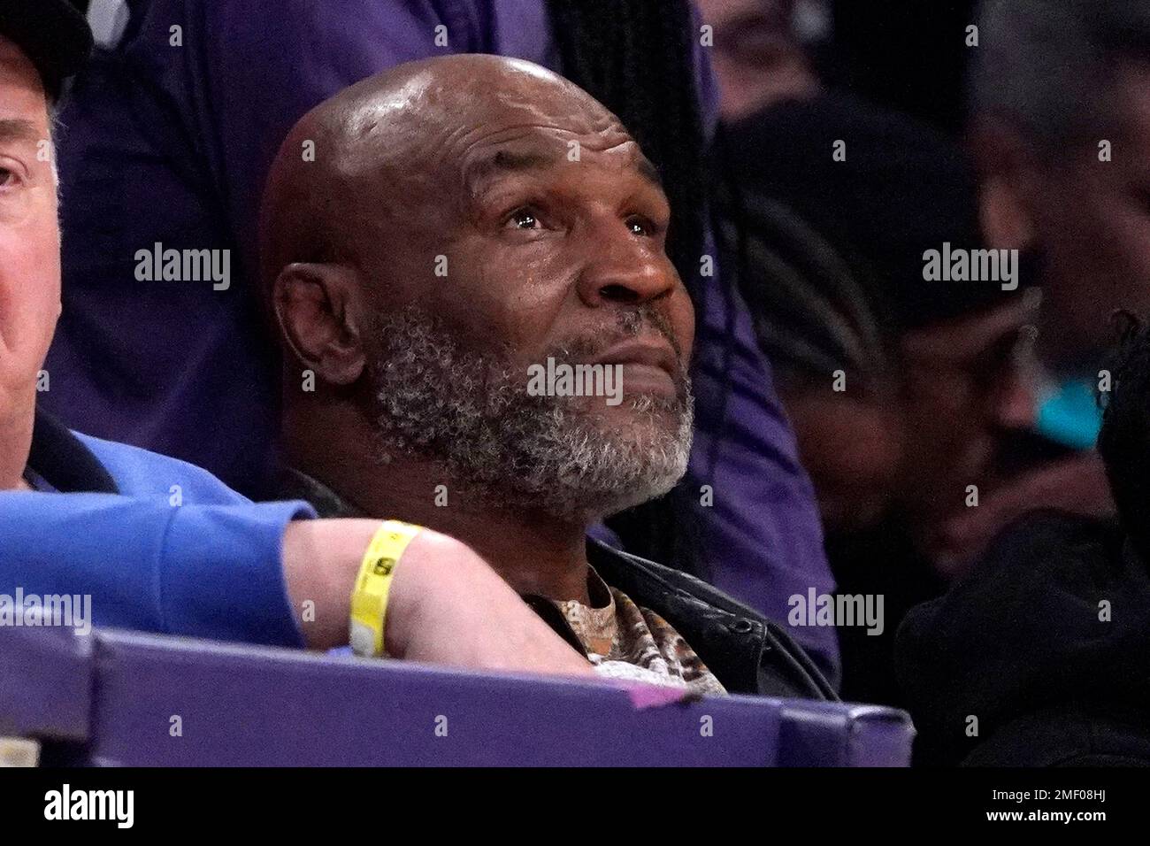 FILE — Mike Tyson watches the first half of an NBA basketball game