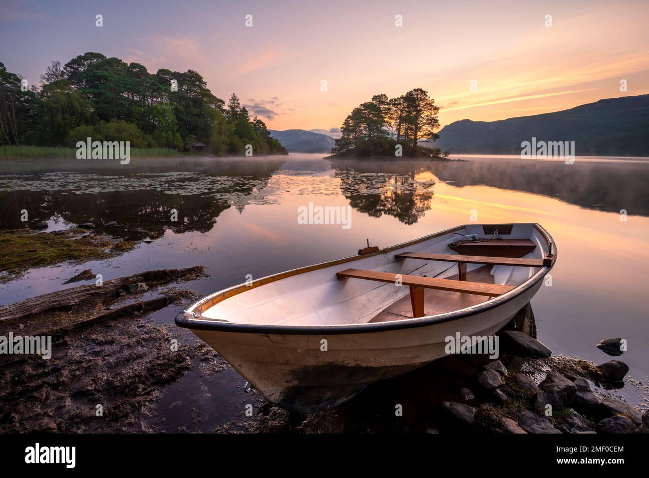 Old wooden rowing boat shoreline hi-res stock photography and images ...