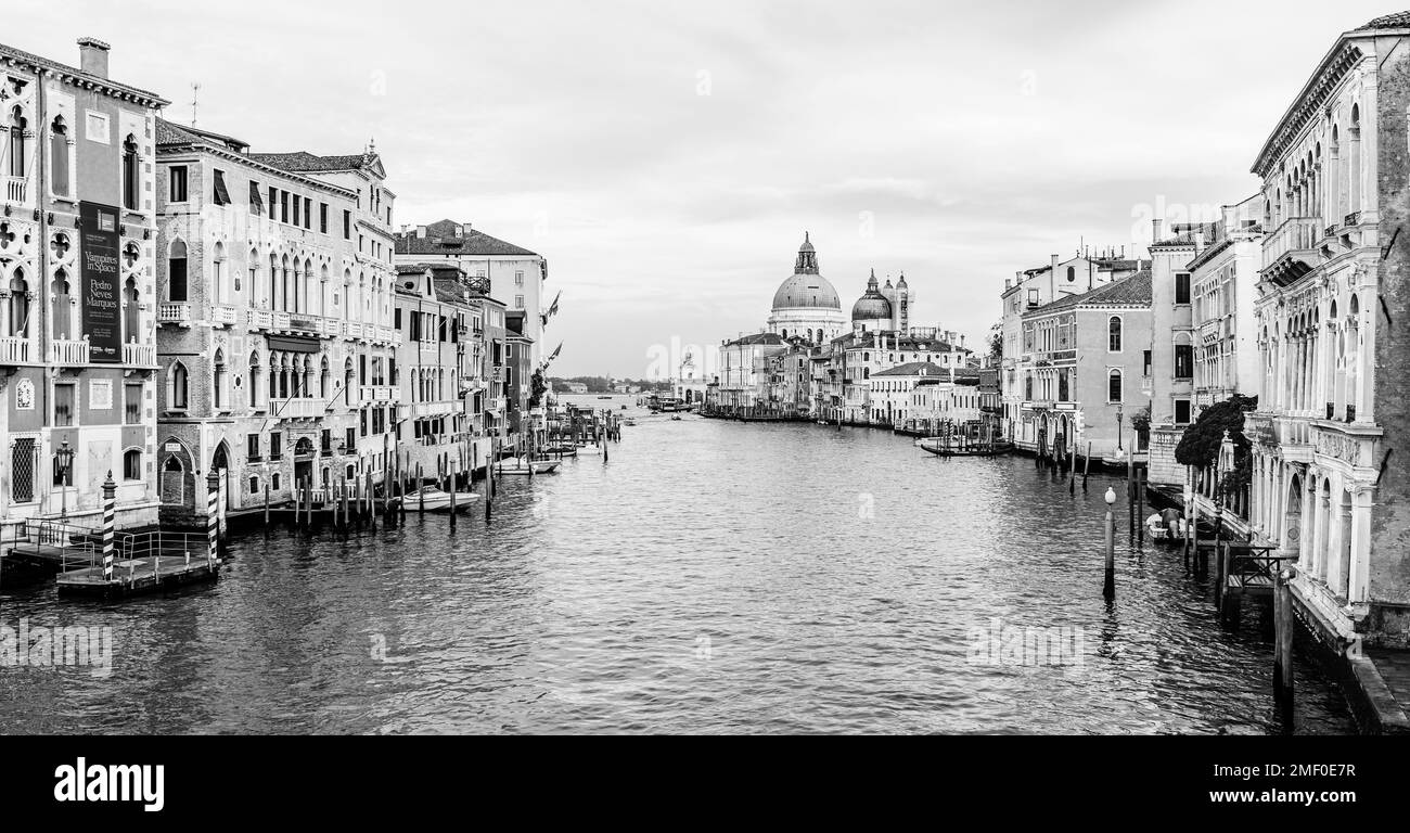 Venice, Italy - November 2022: Cityscape over Grand Canal; View from Academia Bridge overlooking the church of Saint Mary of Health, Santa Maria della Stock Photo