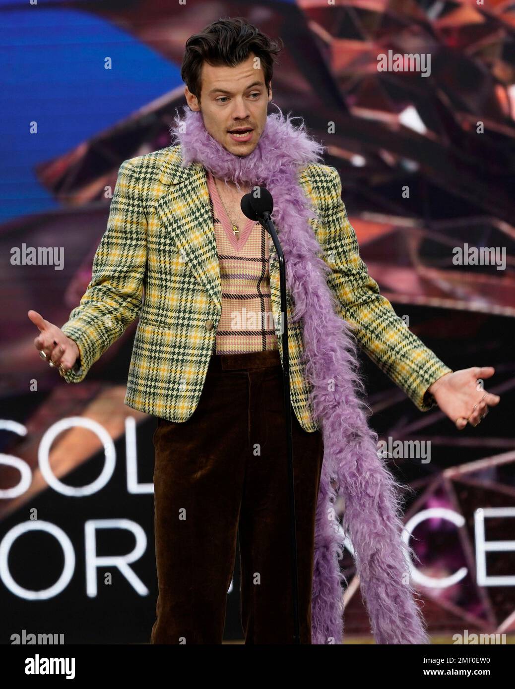 Harry Styles accepts the award for best pop solo performance for ...